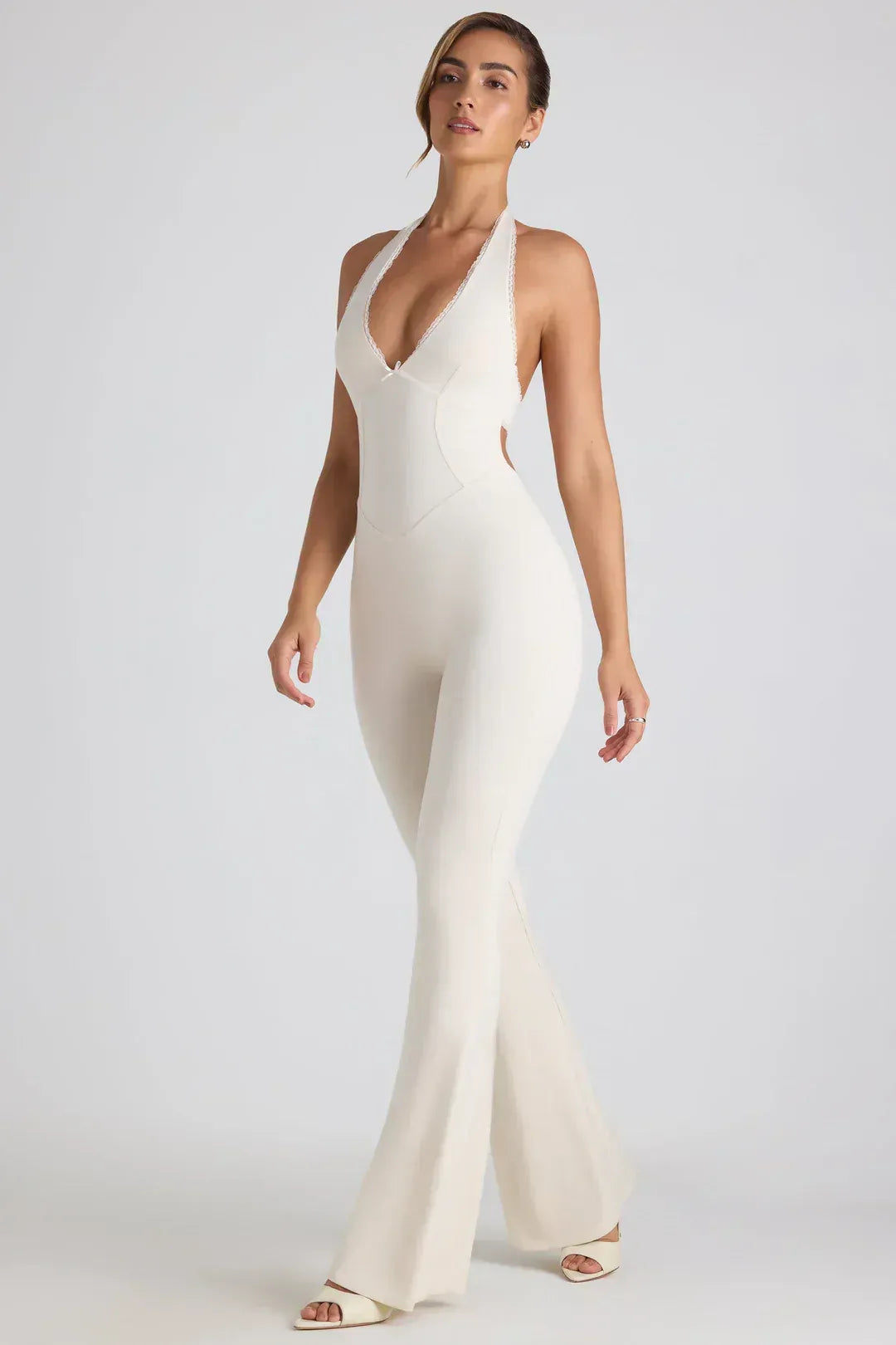 Pema - Backless Halter Flare-Leg Jumpsuit