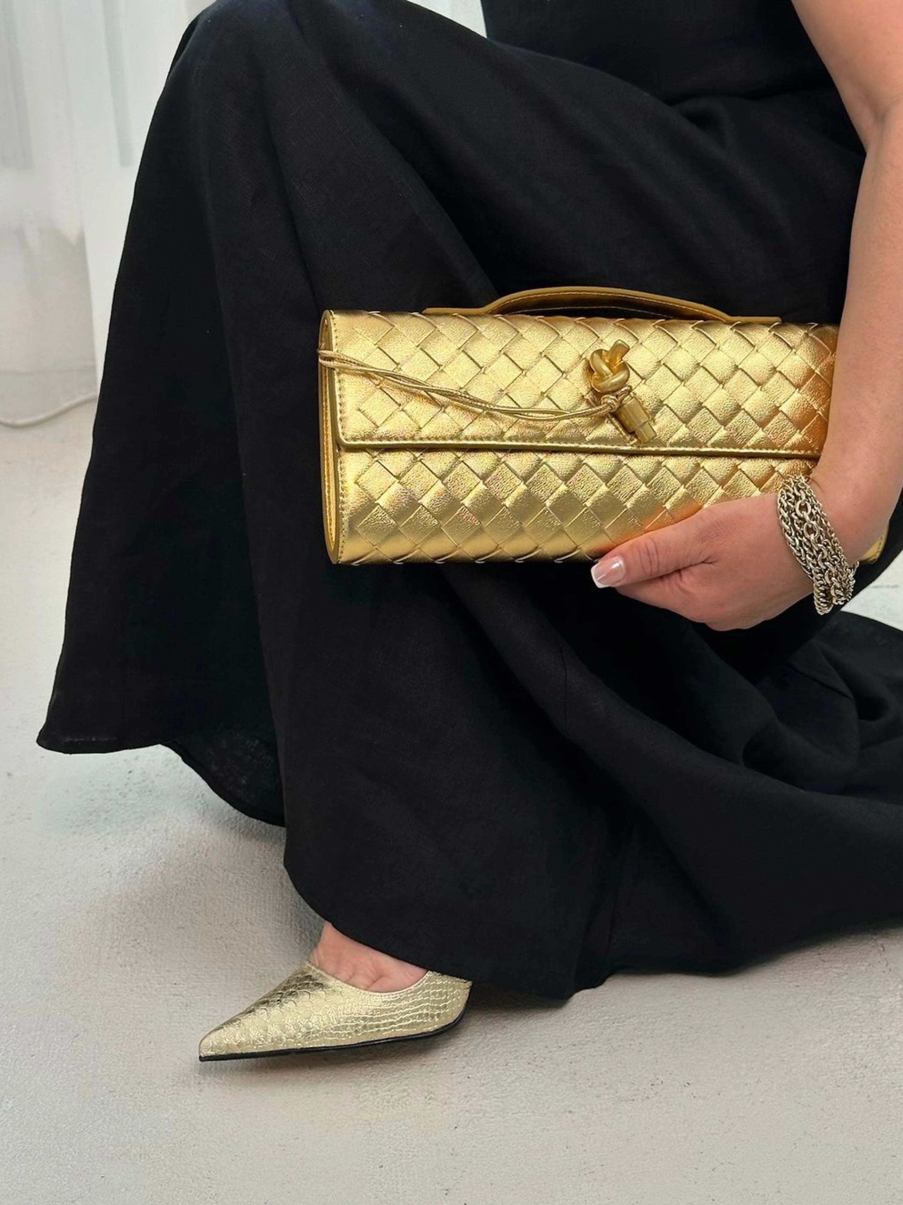 Women’s Woven Leather Crossbody Clutch