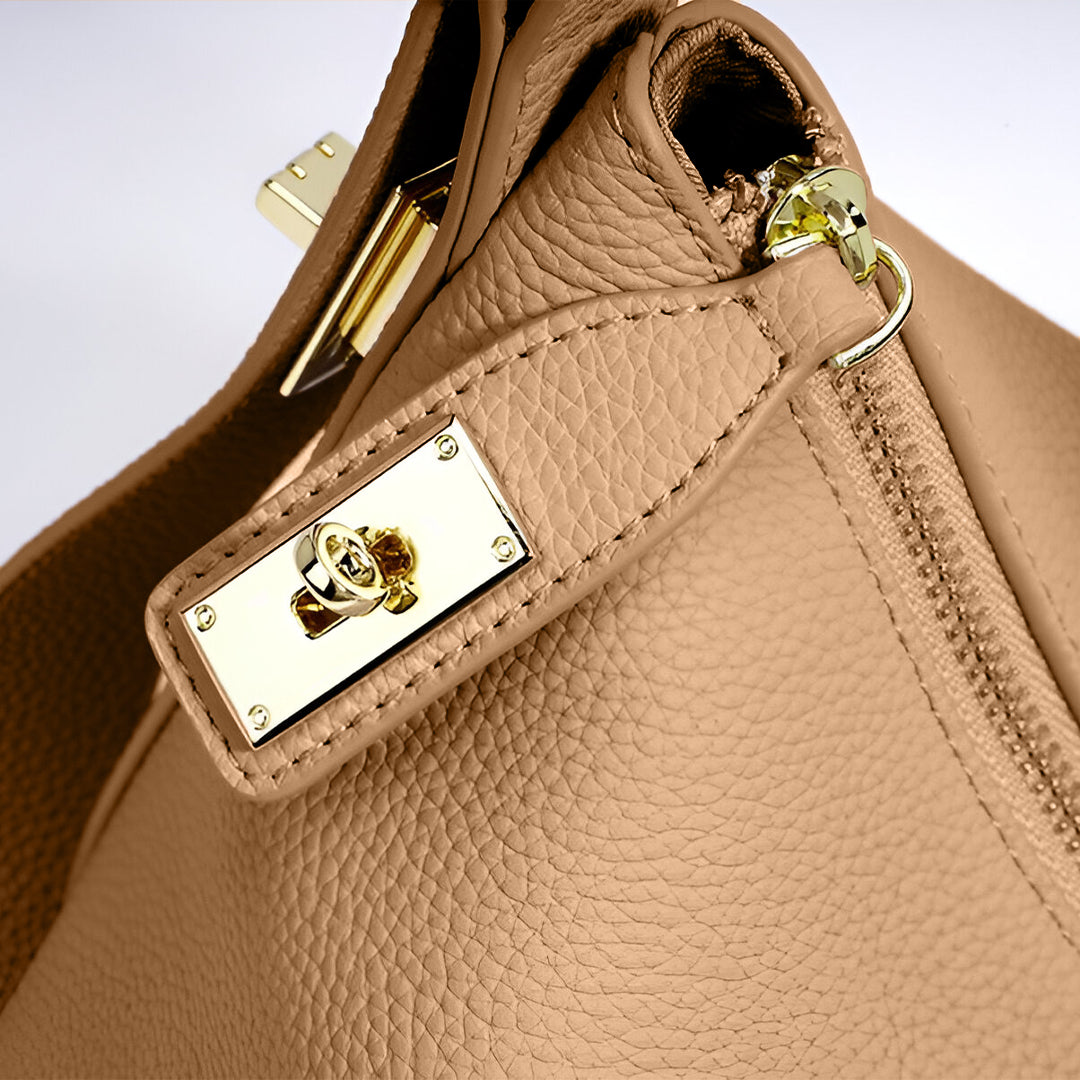 Delia - Sculpted Lock Shoulder Bag